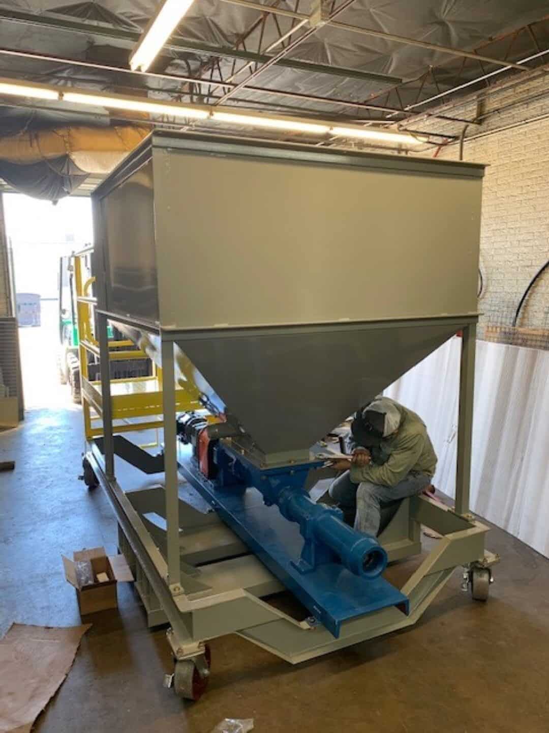 Custom industrial hopper and support frame fabrication