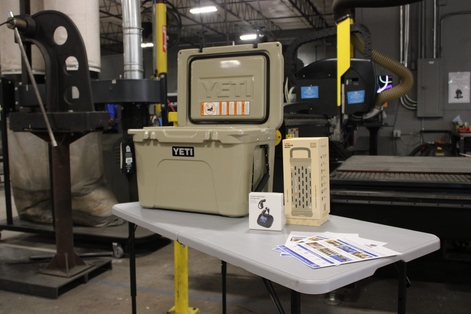 A Yeti cooler and gift box on a display table in the shop
