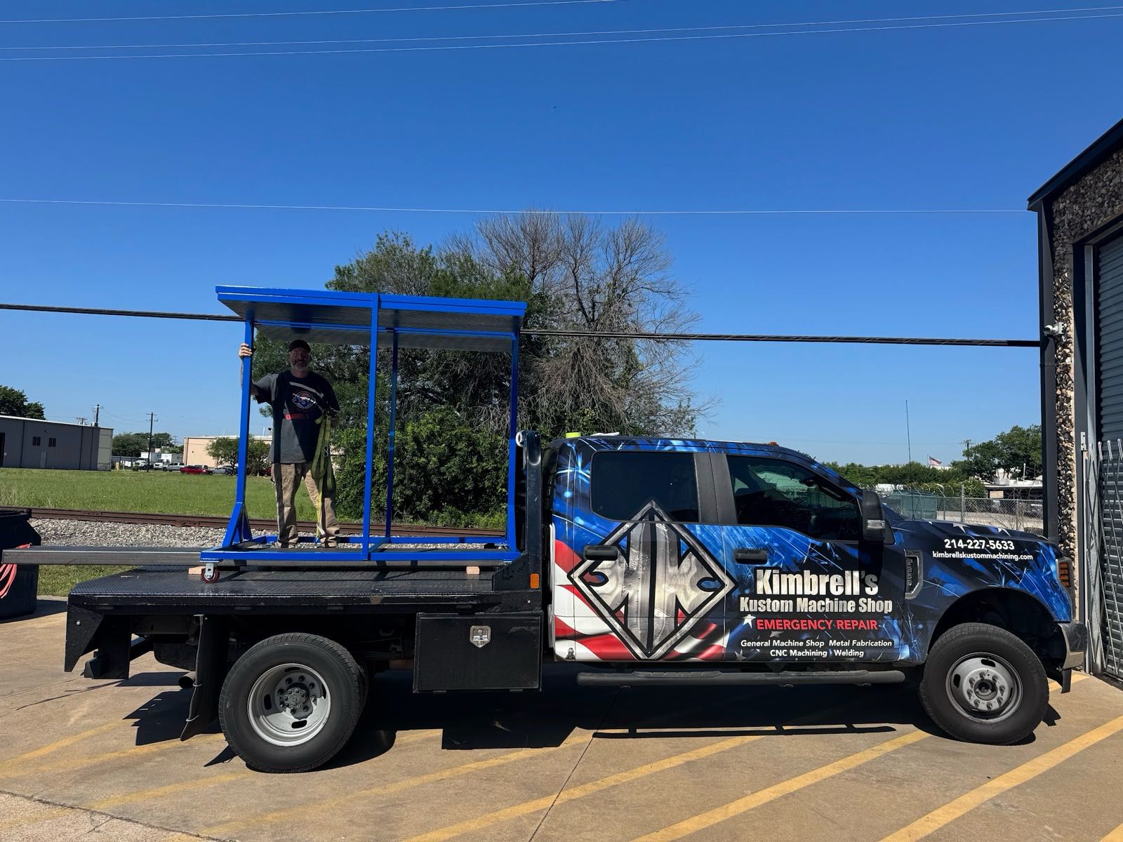 Kimbrell service truck loaded with a fabricated steel canopy frame for delivery to a North Texas facility