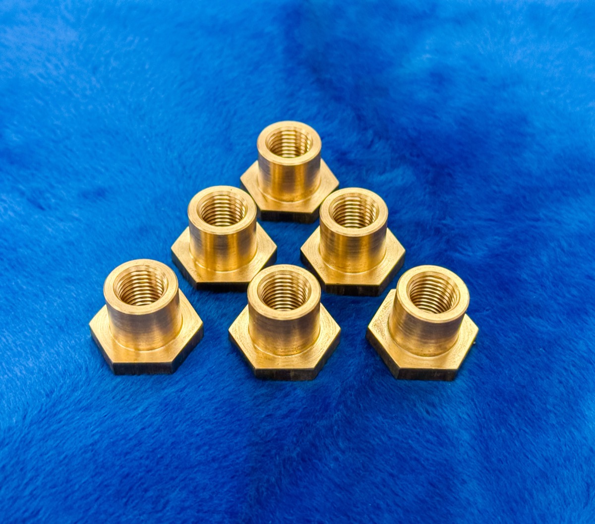 Machined brass hex bushings