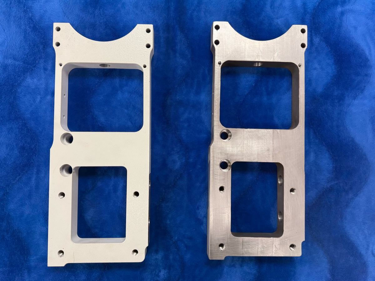 Machined aluminum mounting plate shown raw and finished