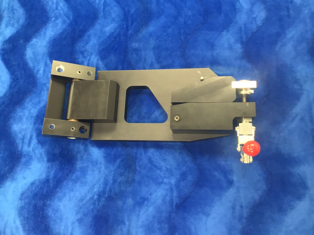Precision-machined fixture with a toggle clamp