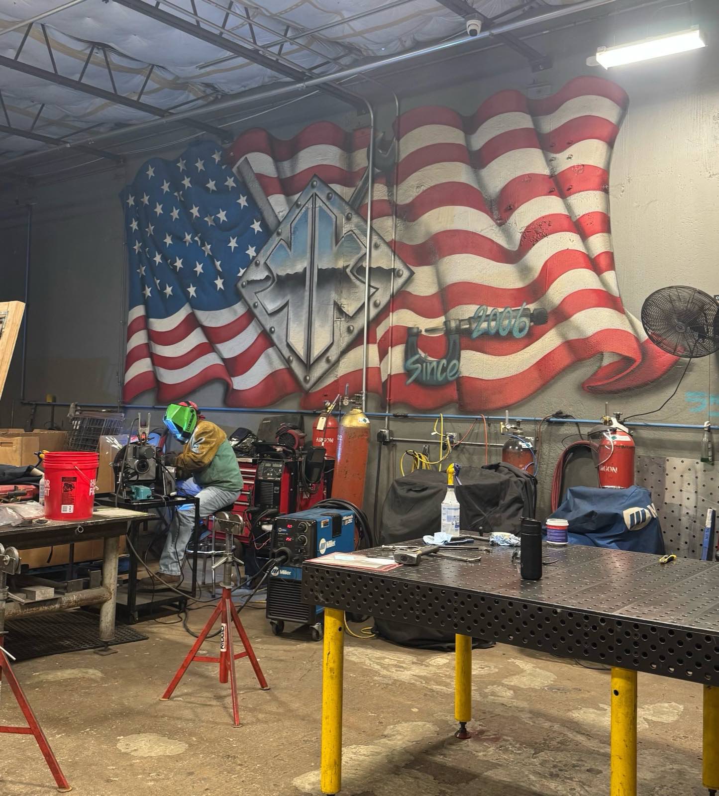 Multiple fabrication bays with MIG, TIG, and laser welding
