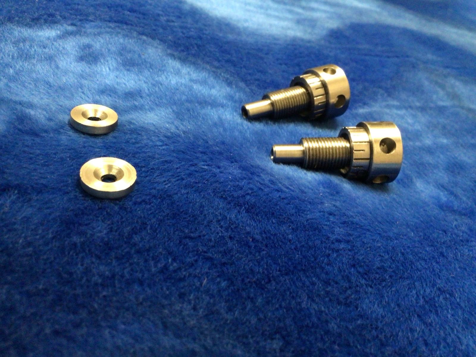 Precision-machined pins and countersunk washers made at Kimbrell Manufacturing Corporation